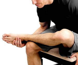 https://www.knee-pain-explained.com/images/seated-piriformis-stretch-pretzel.jpg